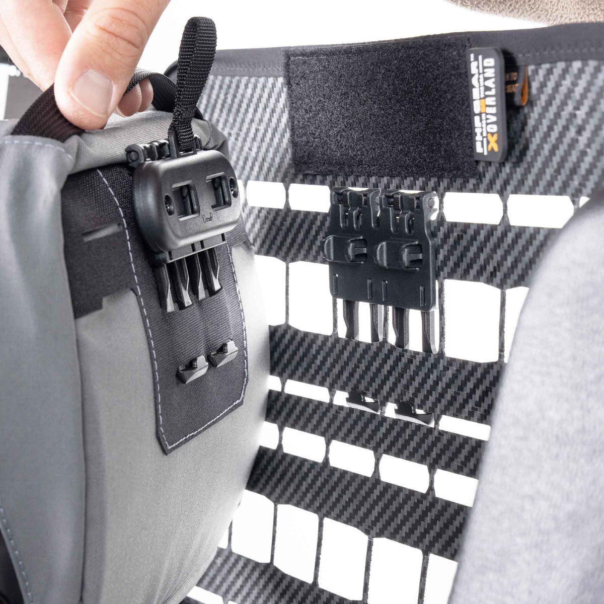Back of The Waypoint GP Pouch in grey being mounted to Snapcor buckles in The Bulkhead.