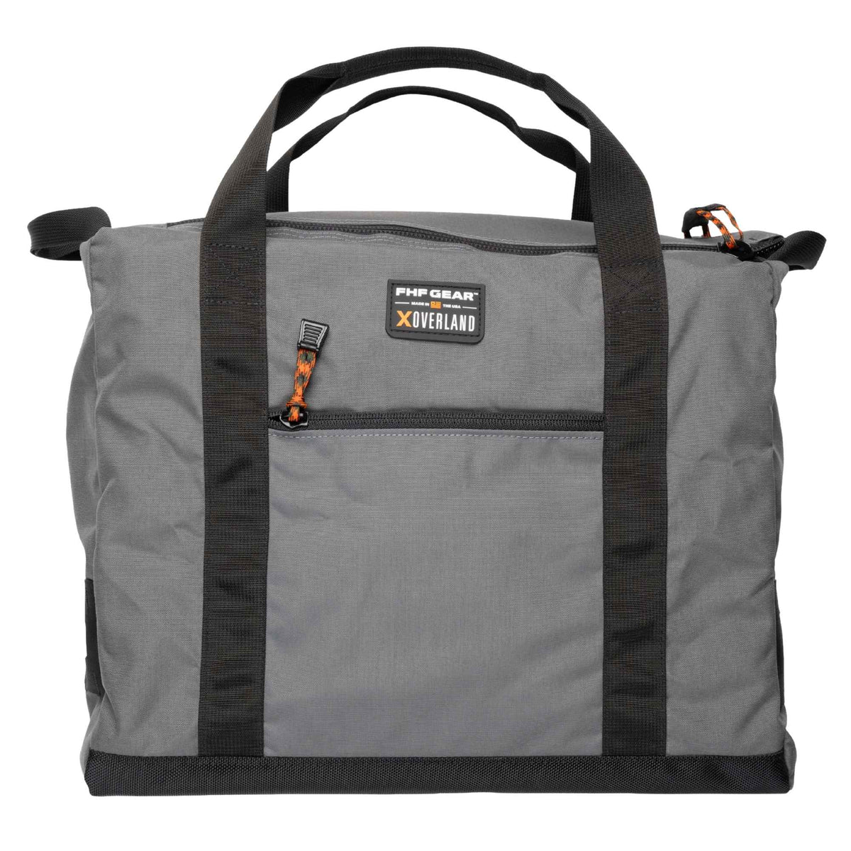 FHF The Stage Tote in grey with black straps, orange cords on zippers and FHF XOVERLAND branding.