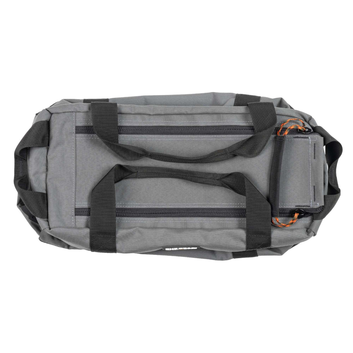 Top view of the FHF The Stage Tote in grey with black straps, orange cords on zippers.